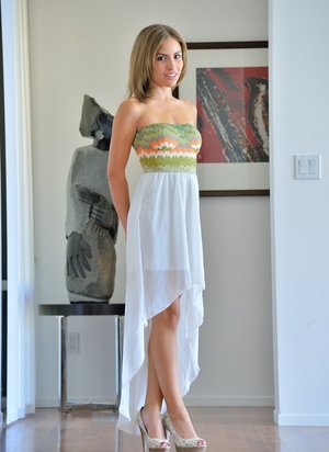 18 tear old schoolgirl Tiff Bannister takes selfies while disrobing in bedroom